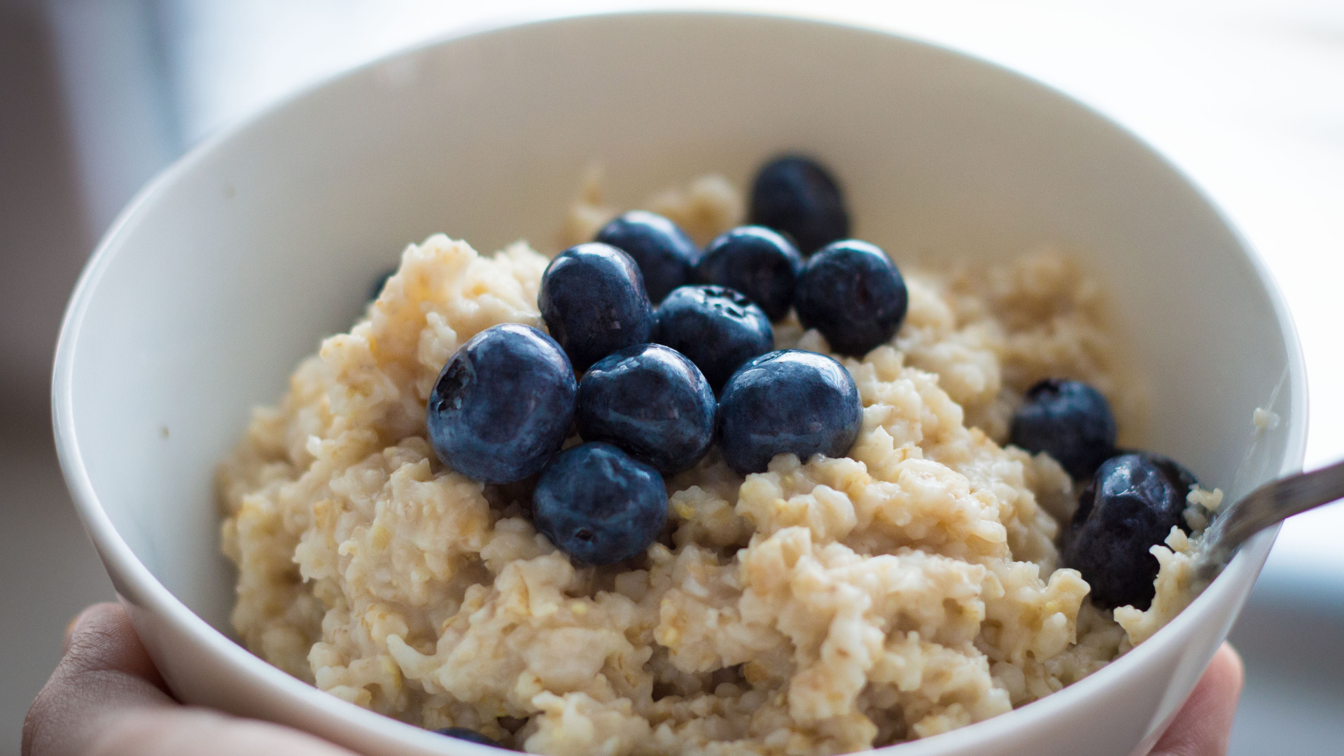 bowl of oatmeal with blueberries